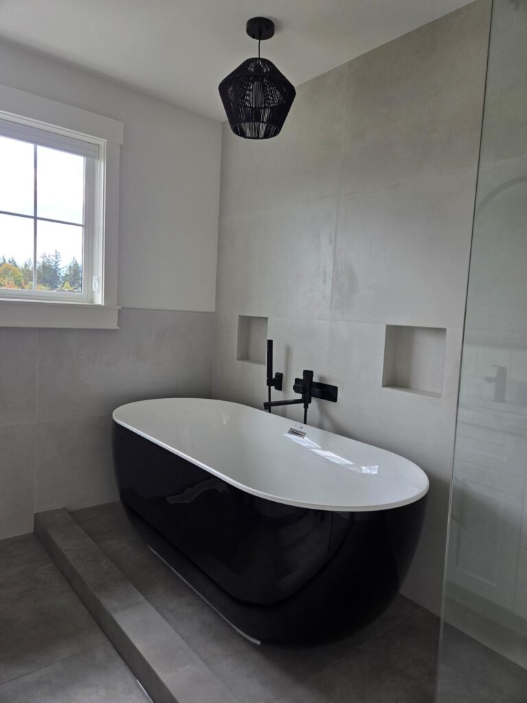 Custom bathroom renovation in White Rock with Zero Bianca 24x48 tiles on floor and walls