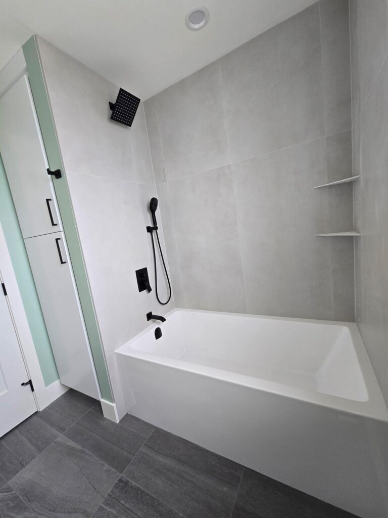 Detailed view of Zero Bianca 24x48 floor tiles installed in White Rock bathroom