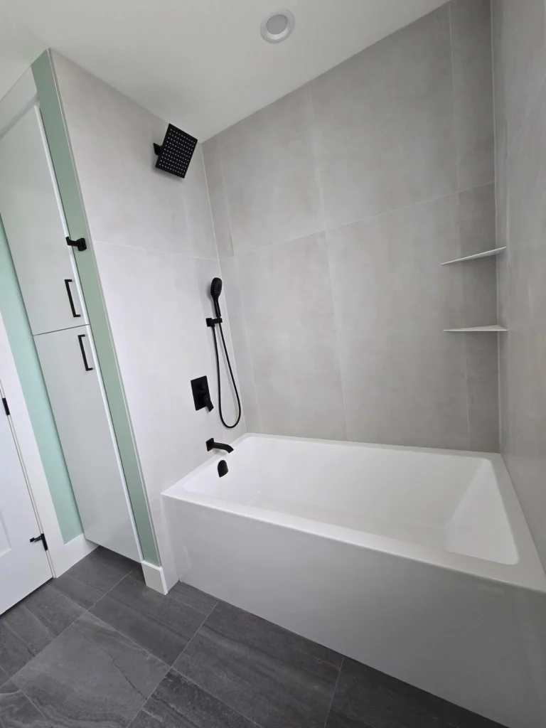 Detailed view of Zero Bianca 24x48 floor tiles installed in White Rock bathroom