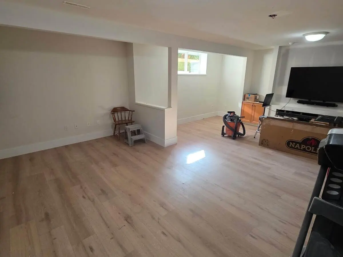 Vinyl plank flooring installed in a finished basement in Langley, BC