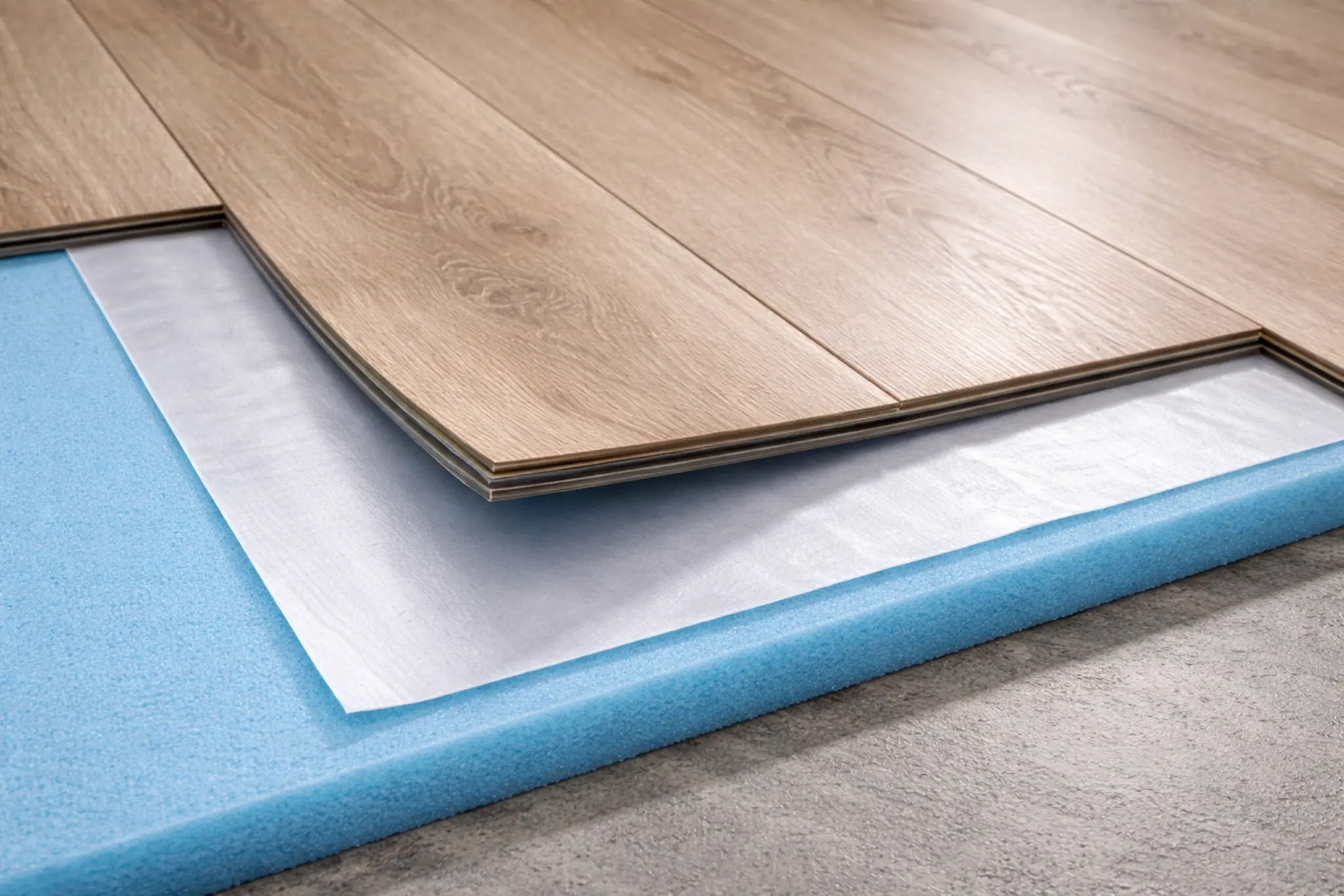 underlayment for vinyl plank flooring with foam and moisture barrier layers