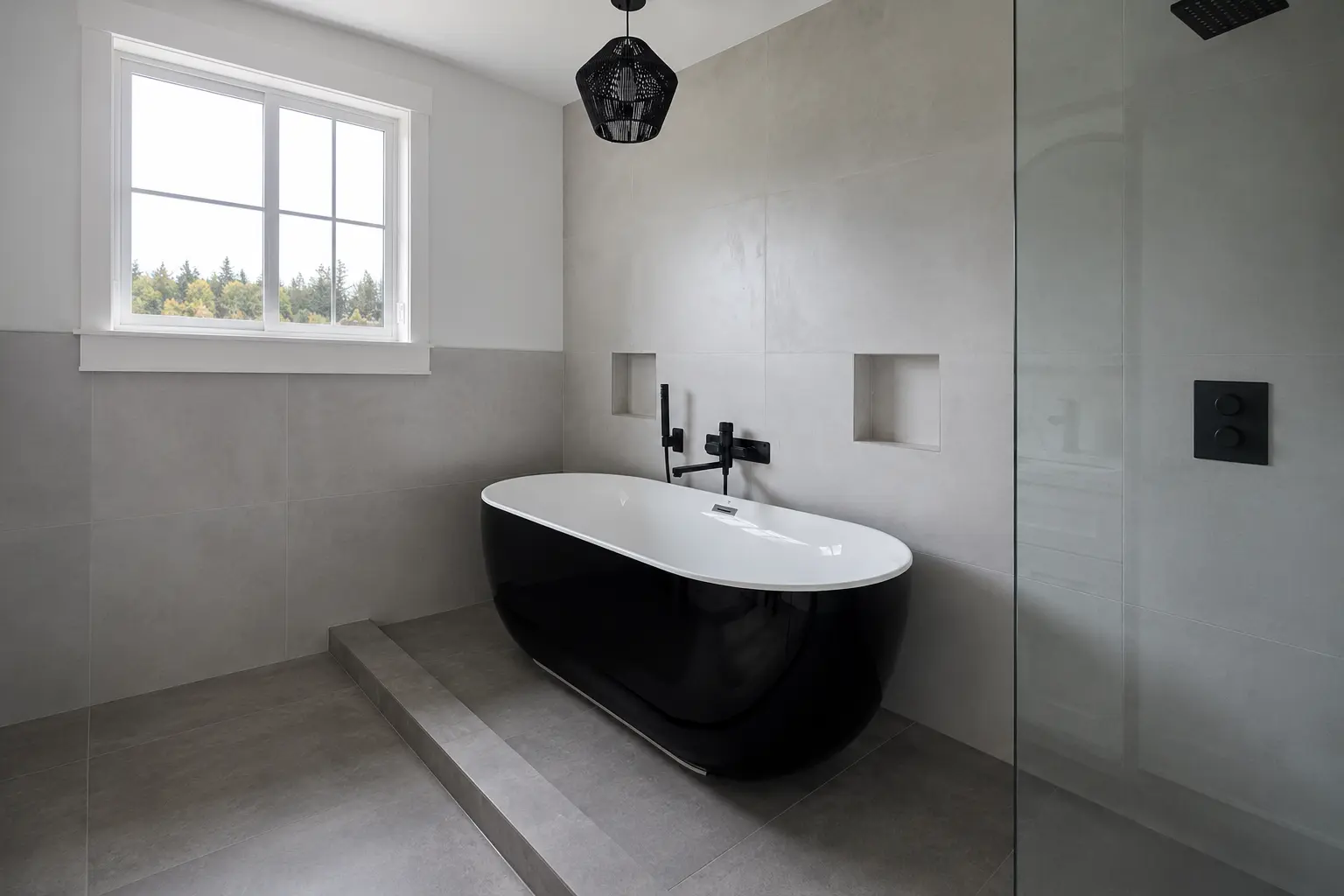 Modern bathroom renovation with large-format porcelain wall and floor tiles