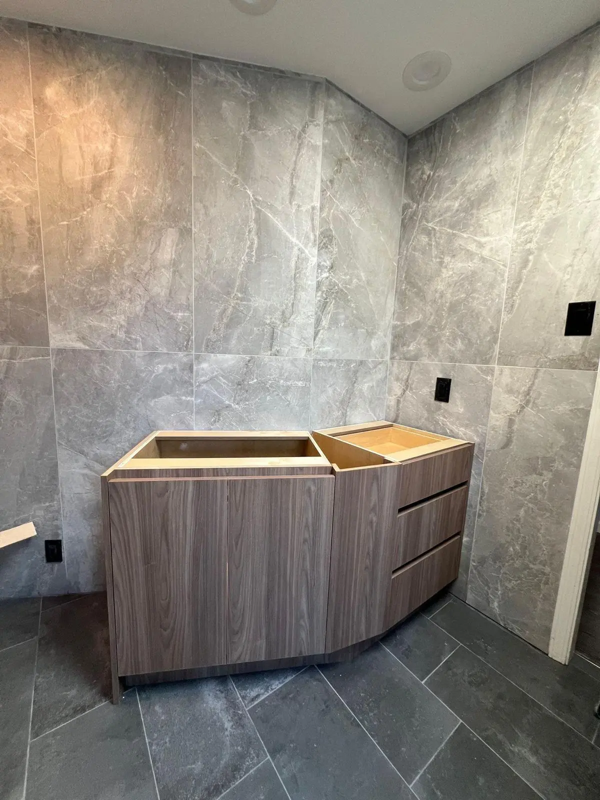 Custom wood-look bathroom vanity with drawers in Kerrisdale Vancouver