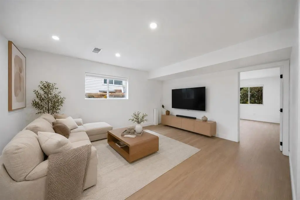 Renovated living room with new flooring in White Rock home